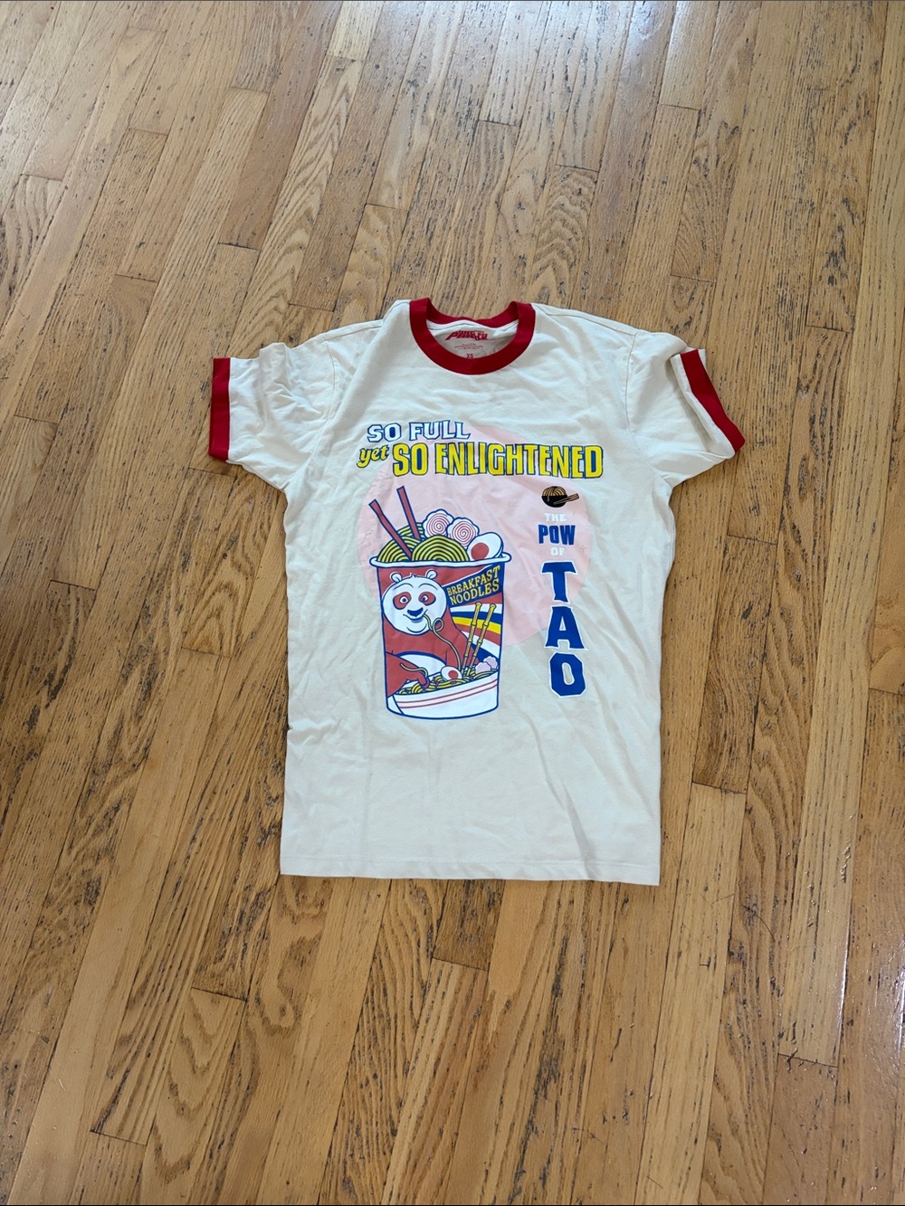 Cream Ringer Tee with Red Trim and Playful Noodle Cup Graphic